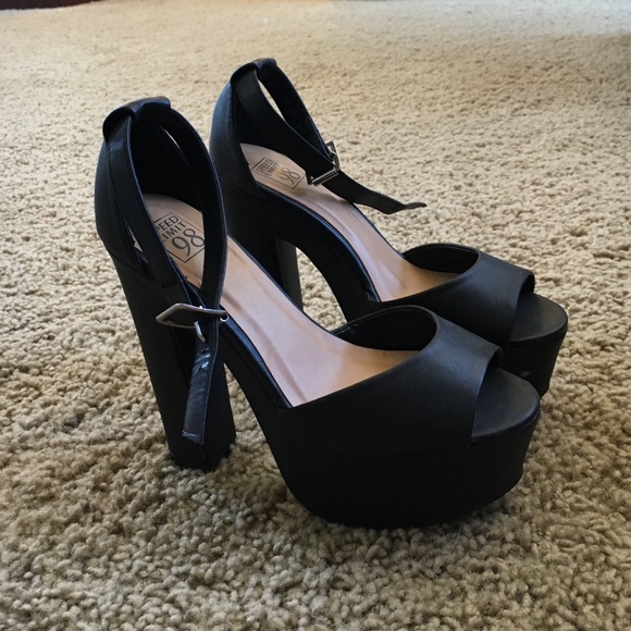 Black ankle strap platforms