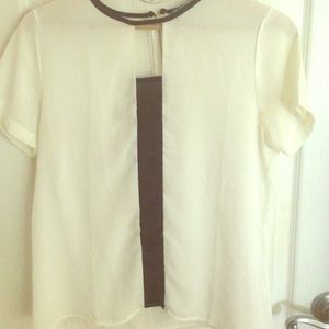 White shirt lined with black ✨✨