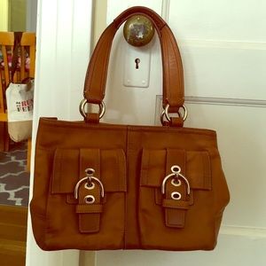 Brown leather coach purse
