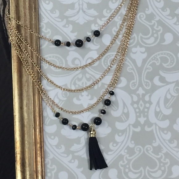 Multi layer tassel necklace