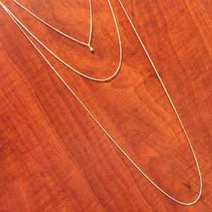 A pretty 3 level gold tone necklace
