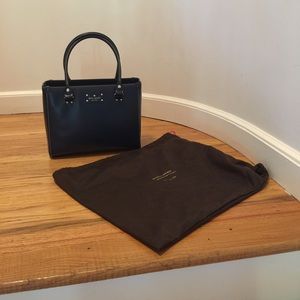 Navy blue, like new handbag. Classy.