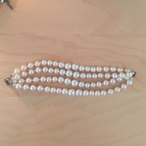 Multi-strand pearl bracelet.