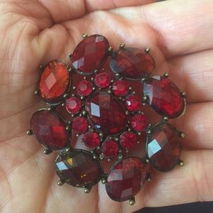 Red rhinestone flower brooch