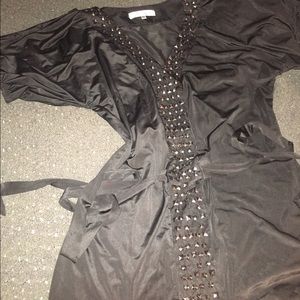 Cute studded mini w tie in back from Stash