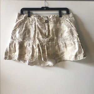 Light kaki camo skirt.