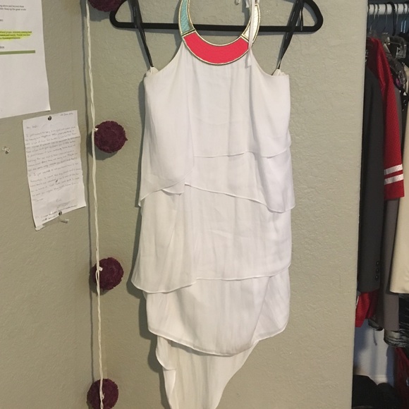 White backless dress with high neck