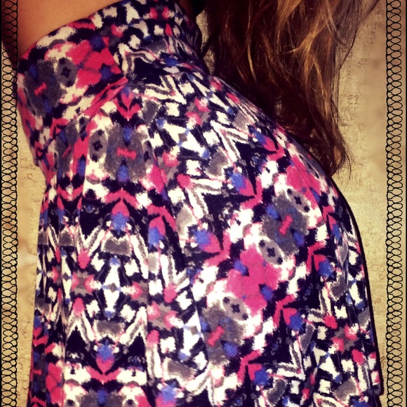 Black, pink, white, and blue mini skirt.