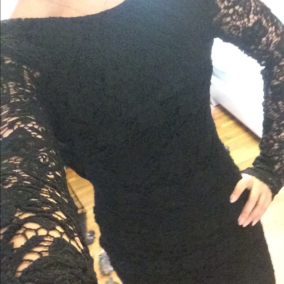 Black long sleeve lace dress with draped open back
