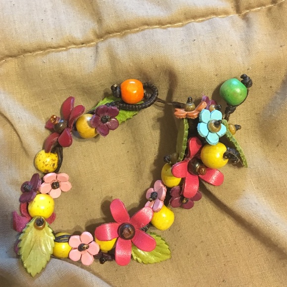 Faux leather flower bracelet, never worn!
