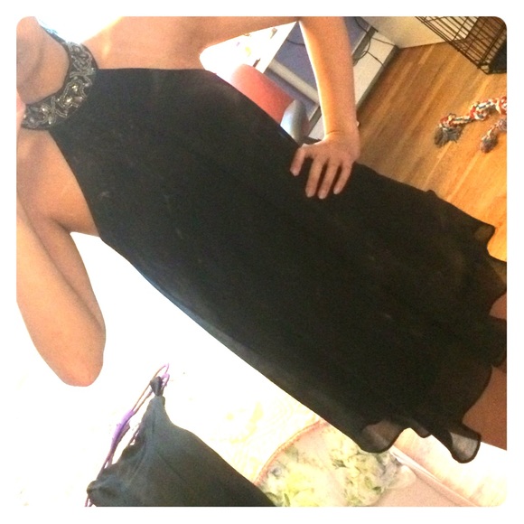 Black halter dress with neck embellishments