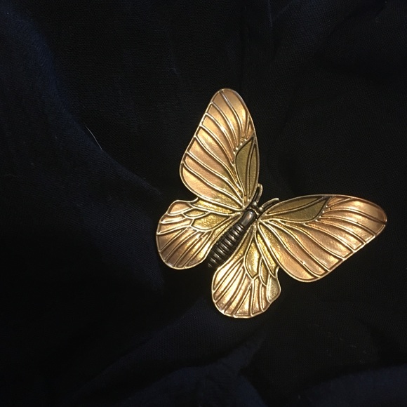 Gold/rose gold adjustable size ring. Rarely worn.