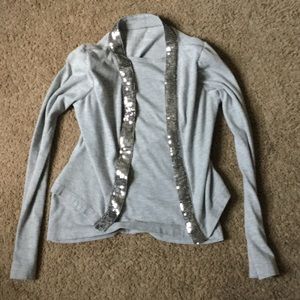A Silver gray long sleeve shirt