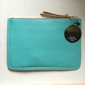 H Butler Clutch that charges your smartphone