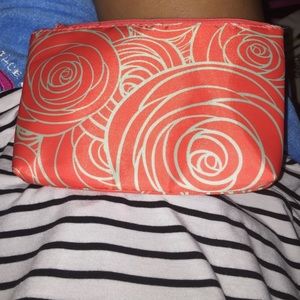 Tulip-patterned, pink make up bag!