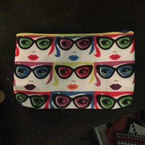 Make up bag with faces on it!