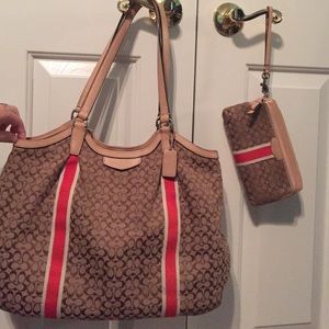 Brown coach purse with orang detailing!