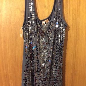 Comfy flashy dress. Knee length.