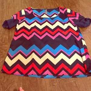 Francesca's colorful top