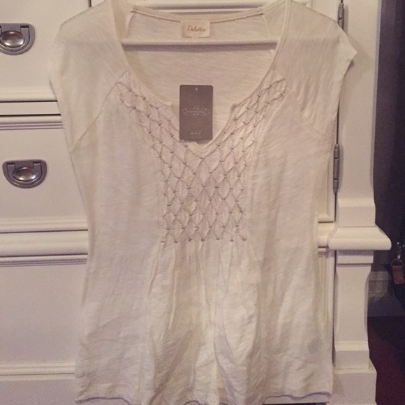 White sleeveless top