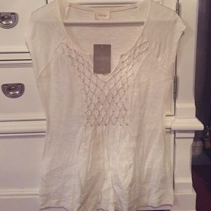 White sleeveless top