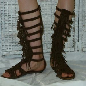 Bebe leather fringe knee length glacier sandal