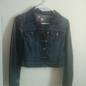 Denim jacket with leather sleeves