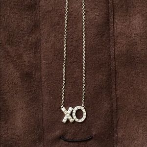 14k White gold diamond XO necklace