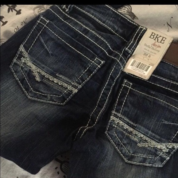 buckle skinny jeans