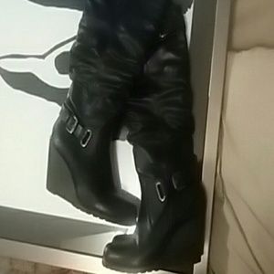 Black leather knee-high boots