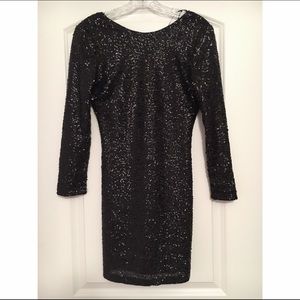 Tight black sequined long sleeve short dress