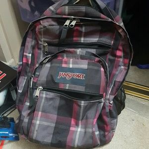 Large multipocket Jansport plaid backpack