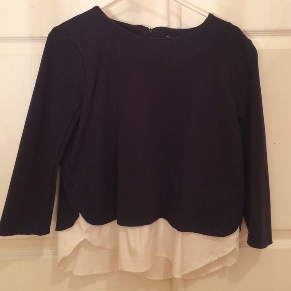 Navy blue boat neck shirt w/ white blouse underlay