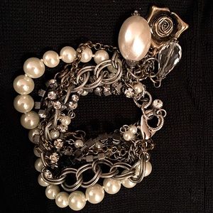 NWT 7-Strand bracelet with 3 charms