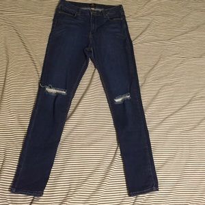 High waisted jeans with rips in the knee size 30