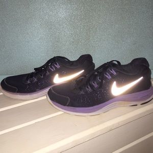 Navy and purple lunarlon Nike running shoes