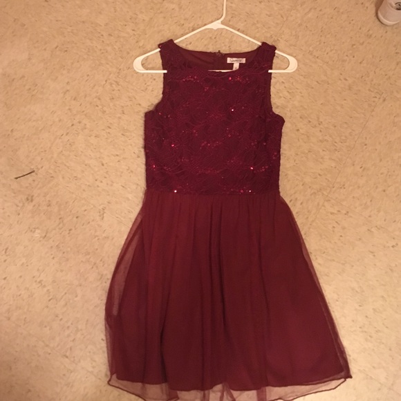 Maroon Thigh length dress with Sequins.