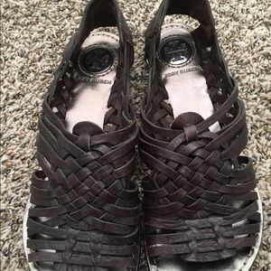Tory Burch leather slip on sandals.