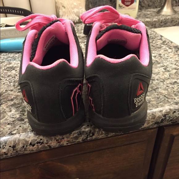 Reebok pink and black nanos.