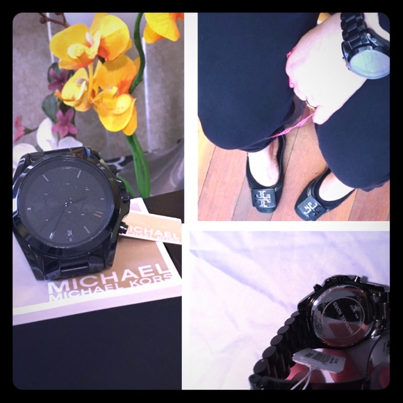 Limited edition autentic black Michael kors watche