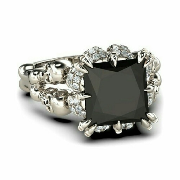 Skull Holding a Beautiful 4ct Black Cz Ring