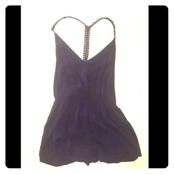 Black lowcut romper, size S