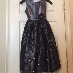 Girls dress.  Beautiful.  Stunning details