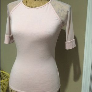 Light pink form fitting top