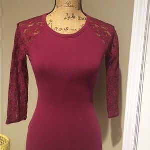 Dark red form fitting 'night out top'