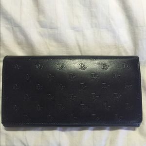 Christian Dior black leather wallet.