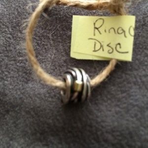 Ring cluster charm retired