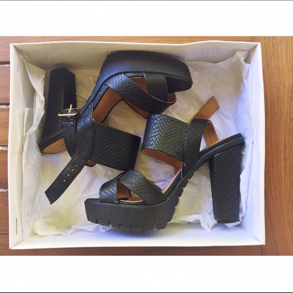 Black Steve Madden Strapped Platform Heels