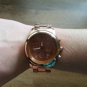 Non authentic rose gold MK watch