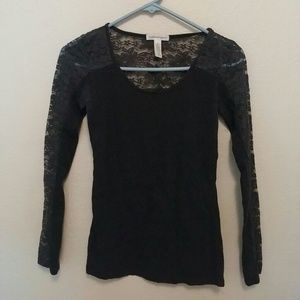 A long sleeve shirt with lace.